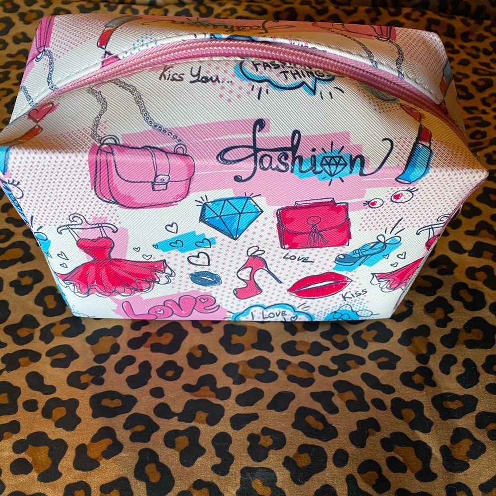 Women’s makeup bag with fashion logos